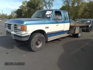 1990 Ford F-250 with VIN 1FTHX26G2LKA30043, listed as a IAAI auction lot 34569128 with 31,439 mi miles and . Bid and sale history available at DreamBid. Image 2.