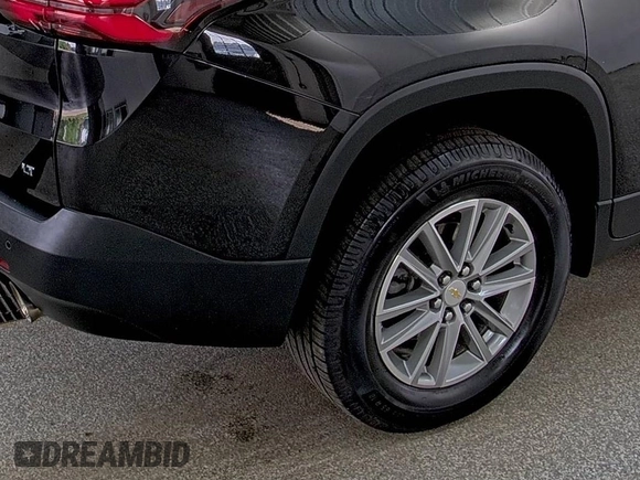 2022 Chevrolet Traverse LT Cloth with VIN 1GNEVMKW7NJ123108, listed as a IAAI auction lot 42854233 with 63,624 mi miles and . Bid and sale history available at DreamBid. Image 12.