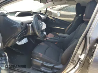 2022 Toyota Prius L Eco z VIN JTDKAMFU1N3157291, wystawiony jako Copart lot #58756485 z przebiegiem 69 737 mil mil oraz Szkoda całkowita • Salvage title. Historia ofert i sprzedaży dostępna na DreamBid. Obrazek 7.