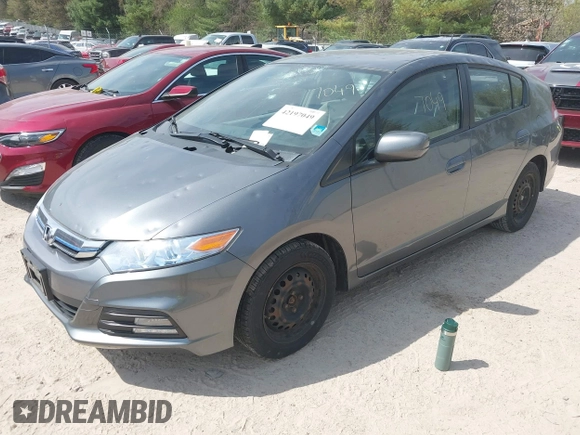 2012 Honda Insight LX with VIN JHMZE2H54CS004239, listed as a IAAI auction lot 42197049 with 113,350 mi miles and . Bid and sale history available at DreamBid. Image 2.