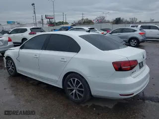 2018 Volkswagen Jetta 1.4T SE with VIN 3VWDB7AJ1JM221517, listed as a IAAI auction lot 41329474 with 87,450 mi miles. Bid and sale history available at carsss.com. Image 3.