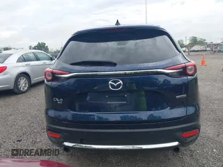 2021 Mazda CX-9 Carbon Edition z VIN JM3TCBDY7M0536005, wystawiony jako IAAI lot #42424129 z przebiegiem 48 005 mil mil oraz . Historia ofert i sprzedaży dostępna na DreamBid. Obrazek 17.