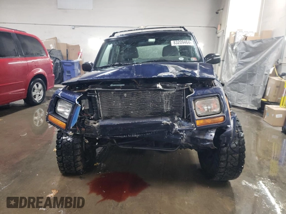 1997 Jeep Cherokee Country with VIN 1J4FJ78S0VL592781, listed as a Copart auction lot 83209464 with 287,206 mi miles and Salvage Title. Bid and sale history available at carsss.com. Image 5.
