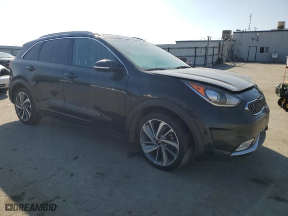 2017 Kia Niro Touring with VIN KNDCE3LC7H5077050, listed as a Copart auction lot 46106265 with 0 mi miles and Salvage Title. Bid and sale history available at carsss.com. Image 4.