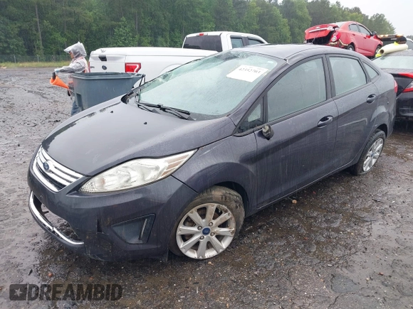 2012 Ford Fiesta SE z VIN 3FADP4BJ4CM155538, wystawiony jako IAAI lot #42352703 z przebiegiem 100 666 mil mil oraz . Historia ofert i sprzedaży dostępna na DreamBid. Obrazek 2.