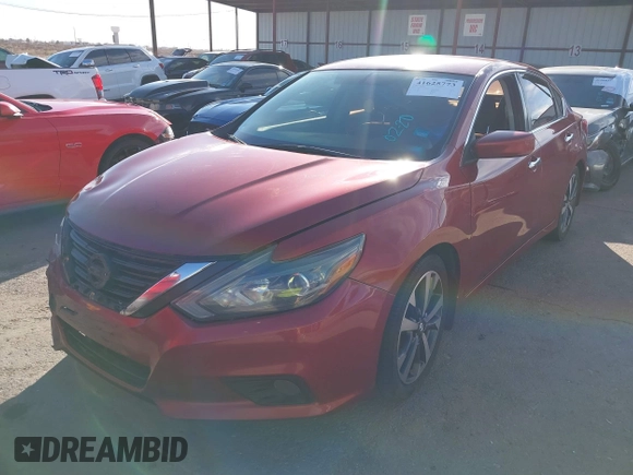 2016 Nissan Altima SR with VIN 1N4AL3AP5GC128614, listed as a IAAI auction lot 41625773 with 123,549 mi miles and . Bid and sale history available at DreamBid. Image 2.