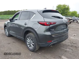 2023 Mazda CX-5 S Select with VIN JM3KFBBM4P0228412, listed as a IAAI auction lot 42194856 with 31,708 mi miles and . Bid and sale history available at carsss.com. Image 3.