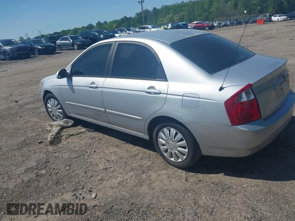 2004 Kia Spectra LX with VIN KNAFE122145037581, listed as a IAAI auction lot 41965681 with 49,817 mi miles. Bid and sale history available at carsss.com. Image 3.