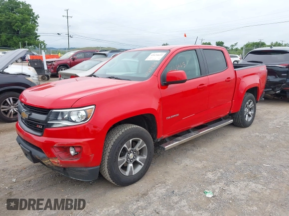 2020 Chevrolet Colorado 4WD Z71 with VIN 1GCGTDEN9L1105636, listed as a IAAI auction lot 42634615 with 106,469 mi miles and . Bid and sale history available at DreamBid. Image 2.