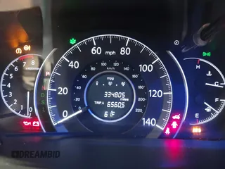 2015 Honda CR-V EX with VIN 2HKRM4H57FH614090, listed as a IAAI auction lot 41940788 with 334,805 mi miles and . Bid and sale history available at DreamBid. Image 7.