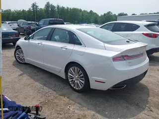 2015 Lincoln MKZ z VIN 3LN6L2G96FR625086, wystawiony jako IAAI lot #42406467 z przebiegiem 24 130 mil mil oraz . Historia ofert i sprzedaży dostępna na DreamBid. Obrazek 3.
