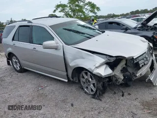 2005 Cadillac SRX z VIN 1GYEE637750119300, wystawiony jako IAAI lot #40815105 z przebiegiem 181 244 mil mil oraz . Historia ofert i sprzedaży dostępna na DreamBid. Obrazek 1.