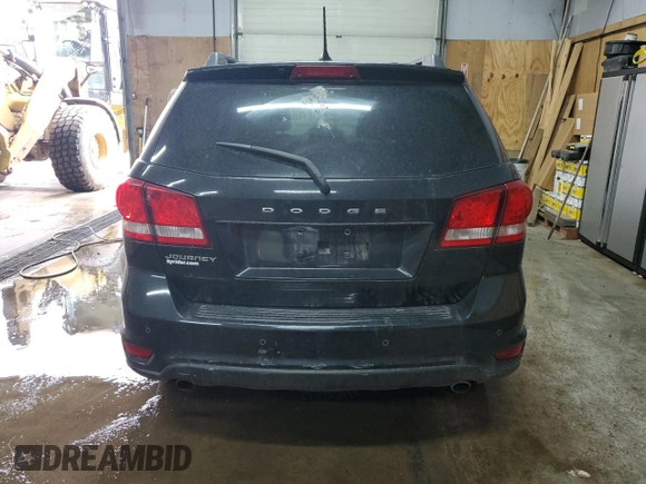 2013 Dodge Journey Crew with VIN 3C4PDCCG4DT693869, listed as a Copart auction lot 63666684 with 134,424 mi miles and Salvage title. Bid and sale history available at DreamBid. Image 6.