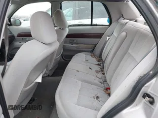 2004 Mercury Grand Marquis GS with VIN 2MEFM74W84X634345, listed as a IAAI auction lot 41920110 with 97,749 mi miles and . Bid and sale history available at DreamBid. Image 8.