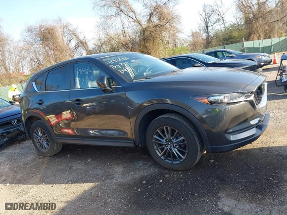 2020 Mazda CX-5 Touring with VIN JM3KFACM2L0786598, listed as a IAAI auction lot 41933368 with 93,657 mi miles. Bid and sale history available at carsss.com. Image 13.