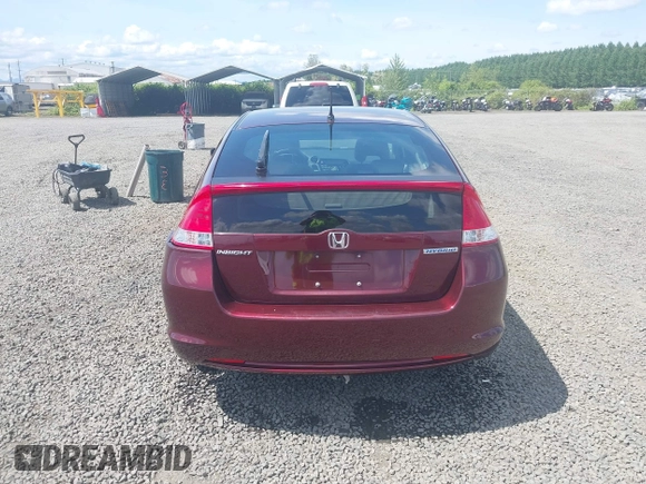 2011 Honda Insight LX z VIN JHMZE2H51BS004312, wystawiony jako IAAI lot #42086422 z przebiegiem 72 814 mil mil oraz . Historia ofert i sprzedaży dostępna na DreamBid. Obrazek 16.