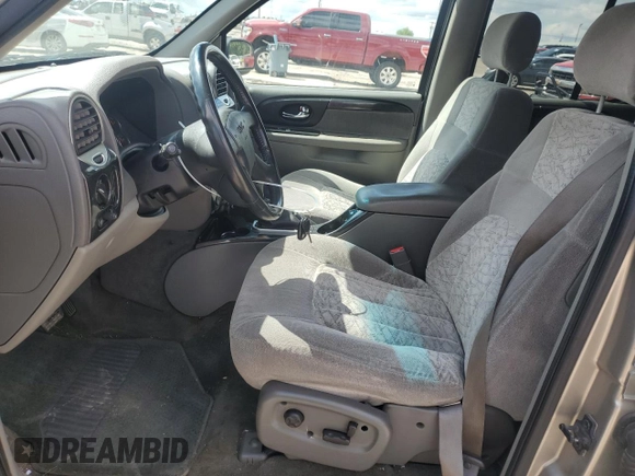 2002 GMC Envoy SLT z VIN 1GKDS13S722253150, wystawiony jako Copart lot #56255185 z przebiegiem 174 198 mil mil oraz Szkoda całkowita • Salvage title. Historia ofert i sprzedaży dostępna na DreamBid. Obrazek 7.
