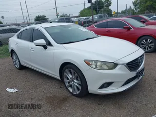 2016 Mazda 6 i Touring with VIN JM1GJ1V54G1421715, listed as a IAAI auction lot 42221065 with 141,354 mi miles and . Bid and sale history available at DreamBid. Image 1.