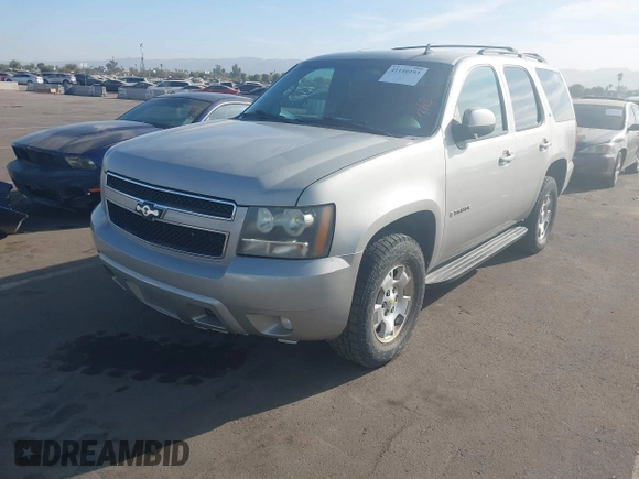 2009 Chevrolet Tahoe 1LT z VIN 1GNFK23049R133033, wystawiony jako IAAI lot #41140193 z przebiegiem 328 375 mil mil oraz . Historia ofert i sprzedaży dostępna na DreamBid. Obrazek 2.