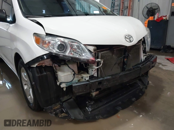 2015 Toyota Sienna L с VIN 5TDZK3DC3FS617518, выставлен на аукционе IAAI как лот 41566048 с пробегом 188 494 миль миль и . История ставок и продаж доступна на DreamBid. Изображение 18.