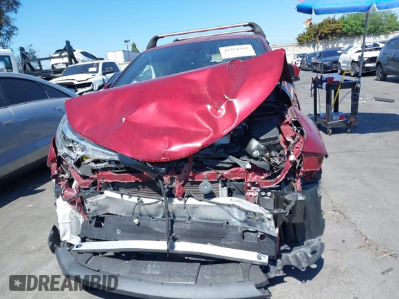 2019 Toyota C-HR XLE with VIN JTNKHMBX1K1060316, listed as a IAAI auction lot 41764464 with 42,956 mi miles. Bid and sale history available at carsss.com. Image 12.