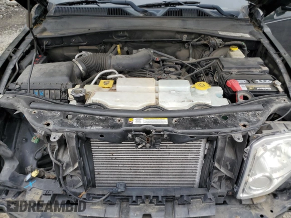 2012 Jeep Liberty Sport with VIN 1C4PJMAK9CW212920, listed as a Copart auction lot 61192785 with 181,561 mi miles and Salvage title. Bid and sale history available at DreamBid. Image 12.