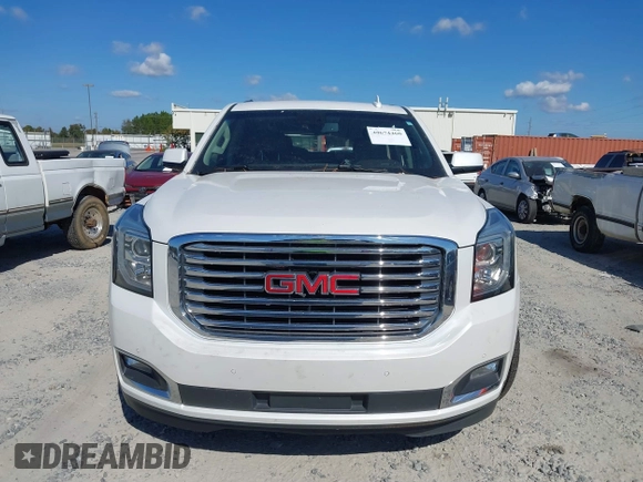2019 GMC Yukon SLT with VIN 1GKS1BKC9KR332014, listed as a IAAI auction lot 40674460 with 76,545 mi miles. Bid and sale history available at carsss.com. Image 12.