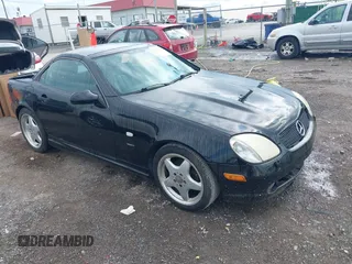 1999 Mercedes-Benz SLK 230/320 z VIN WDBKK47F3XF128937, wystawiony jako IAAI lot #42162885 z przebiegiem Nie podano mil oraz . Historia ofert i sprzedaży dostępna na DreamBid. Obrazek 1.