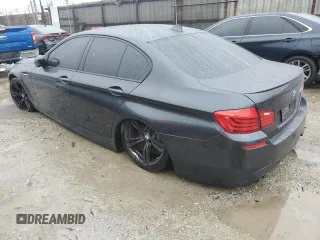 2014 BMW M5 with VIN WBSFV9C5XED593740, listed as a Copart auction lot 45210415 with 76,583 mi miles and Clean Title. Bid and sale history available at carsss.com. Image 2.