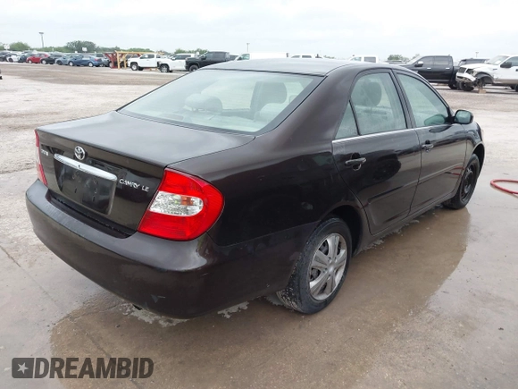 2002 Toyota Camry LE z VIN JTDBE32K720119418, wystawiony jako IAAI lot #42360721 z przebiegiem 235 678 mil mil oraz . Historia ofert i sprzedaży dostępna na DreamBid. Obrazek 4.