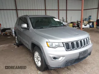 2018 Jeep Grand Cherokee Laredo E with VIN 1C4RJEAG1JC275356, listed as a IAAI auction lot 42150422 with 69,720 mi miles and . Bid and sale history available at DreamBid. Image 1.