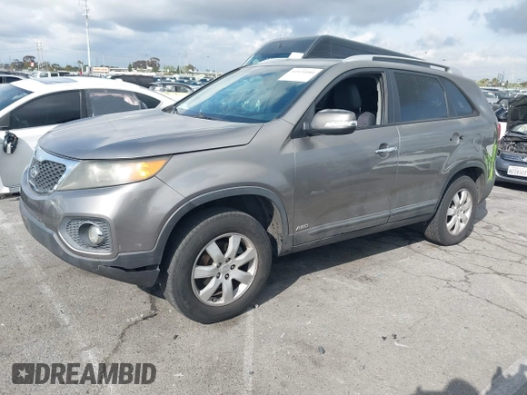 2011 Kia Sorento LX with VIN 5XYKTDA10BG061974, listed as a IAAI auction lot 41924081 with 148,856 mi miles. Bid and sale history available at carsss.com. Image 2.