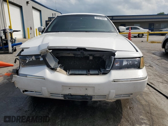 2000 Mercury Grand Marquis GS z VIN 2MEFM74WXYX699560, wystawiony jako Copart lot #57721925 z przebiegiem 246 297 mil mil oraz Szkoda całkowita • Salvage title. Historia ofert i sprzedaży dostępna na DreamBid. Obrazek 5.
