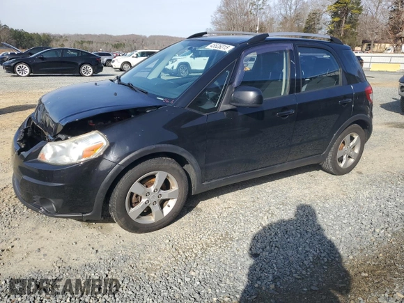 2010 Suzuki SX4 Touring with VIN JS2YB5A70A6300518, listed as a Copart auction lot 45526315 with 161,090 mi miles and Salvage Title. Bid and sale history available at carsss.com. Image 1.