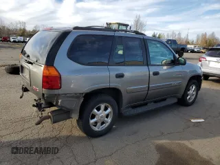 2005 GMC Envoy SLE with VIN 1GKDS13S952104730, listed as a Copart auction lot 47778585 with 187,712 mi miles and Salvage Title. Bid and sale history available at carsss.com. Image 3.