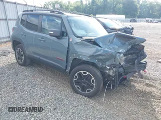 2016 Jeep Renegade Trailhawk z VIN ZACCJBCT7GPD56736, wystawiony jako IAAI lot #42207012 z przebiegiem 82 392 mil mil oraz . Historia ofert i sprzedaży dostępna na DreamBid. Obrazek 1.