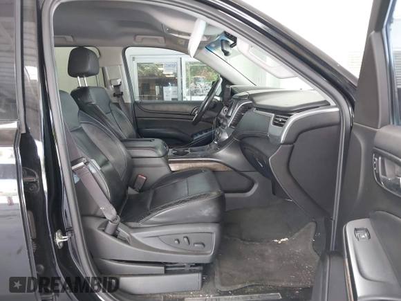 2015 Chevrolet Suburban LT with VIN 1GNSKJKC7FR199544, listed as a IAAI auction lot 42169017 with 219,219 mi miles and . Bid and sale history available at DreamBid. Image 5.