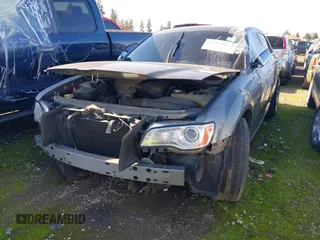 2012 Chrysler 300 Limited with VIN 2C3CCACG9CH249856, listed as a IAAI auction lot 38629940 with Not Provided miles and . Bid and sale history available at DreamBid. Image 2.