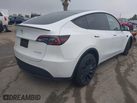 2022 Tesla Model Y Performance with VIN 7SAYGDEF0NF400560, listed as a IAAI auction lot 41783912 with 36,513 mi miles and . Bid and sale history available at DreamBid. Image 4.