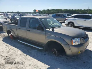 2004 Nissan Frontier XE z VIN 1N6ED29X94C473256, wystawiony jako Copart lot #57796125 z przebiegiem 306 316 mil mil oraz Czysty tytuł • Clean title. Historia ofert i sprzedaży dostępna na DreamBid. Obrazek 4.
