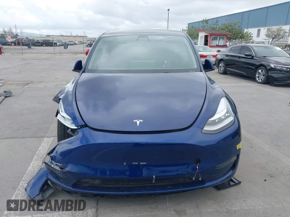2022 Tesla Model Y Long Range with VIN 7SAYGDEE6NF480146, listed as a IAAI auction lot 41906361 with 31,939 mi miles and . Bid and sale history available at carsss.com. Image 12.