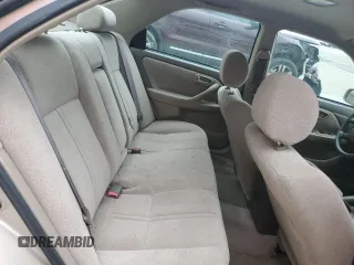 2001 Toyota Camry CE z VIN 4T1BG22K41U104477, wystawiony jako Copart lot #58437155 z przebiegiem 84 355 mil mil oraz Czysty tytuł • Clean title. Historia ofert i sprzedaży dostępna na DreamBid. Obrazek 10.