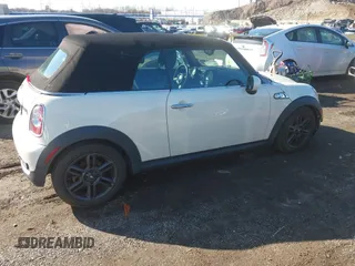 2011 MINI Convertible S with VIN WMWZP3C54BTX82748, listed as a IAAI auction lot 41817396 with 113,458 mi miles and . Bid and sale history available at DreamBid. Image 4.
