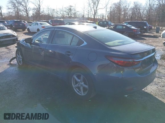 2021 Mazda 6 Carbon Edition with VIN JM1GL1WY3M1603064, listed as a IAAI auction lot 41199852 with 118,307 mi miles and . Bid and sale history available at DreamBid. Image 3.