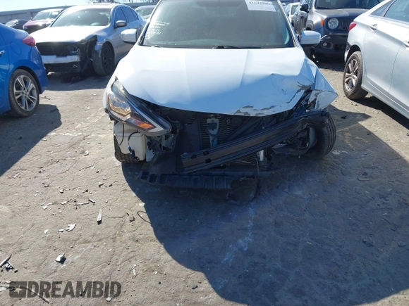 2019 Nissan Sentra S z VIN 3N1AB7AP4KY265082, wystawiony jako IAAI lot #41642989 z przebiegiem 75 937 mil mil oraz . Historia ofert i sprzedaży dostępna na DreamBid. Obrazek 6.