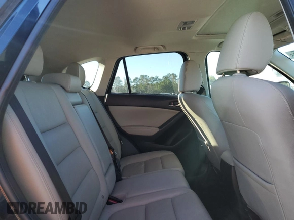 2014 Mazda CX-5 Grand Touring with VIN JM3KE4DY1E0405493, listed as a Copart auction lot 41688915 with 94,970 mi miles and Salvage Title. Bid and sale history available at carsss.com. Image 12.