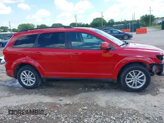 2014 Dodge Journey SXT z VIN 3C4PDCBG2ET161135, wystawiony jako IAAI lot #42233836 z przebiegiem 119 230 mil mil oraz . Historia ofert i sprzedaży dostępna na DreamBid. Obrazek 14.