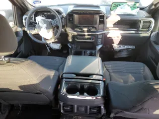 2023 Ford F-150 XL with VIN 1FTFW1E51PKF30933, listed as a Copart auction lot 76121834 with 26,267 mi miles and Salvage Title. Bid and sale history available at carsss.com. Image 8.