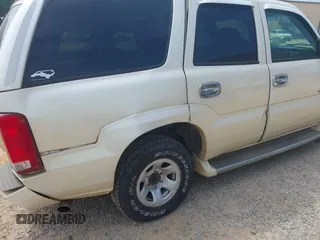 2006 Cadillac Escalade z VIN 1GYEK63N46R134468, wystawiony jako IAAI lot #42407664 z przebiegiem 240 664 mil mil oraz . Historia ofert i sprzedaży dostępna na DreamBid. Obrazek 13.