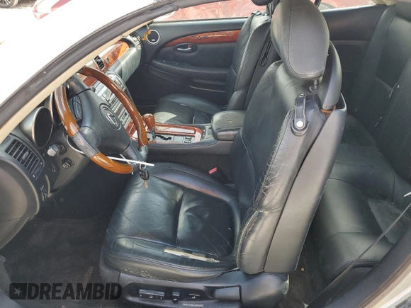 2004 Lexus SC 430 with VIN JTHFN48Y240051291, listed as a Copart auction lot 77631944 with 169,055 mi miles and Salvage Title. Bid and sale history available at DreamBid. Image 7.